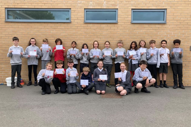 The mathletes from Strand School with their certificates