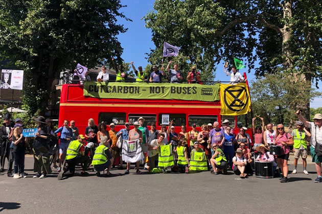 Extinction Rebellion&rsquo;s climate bus travels across South London with the message &lsquo;Cut Carbon Not Buses&rsquo; 
